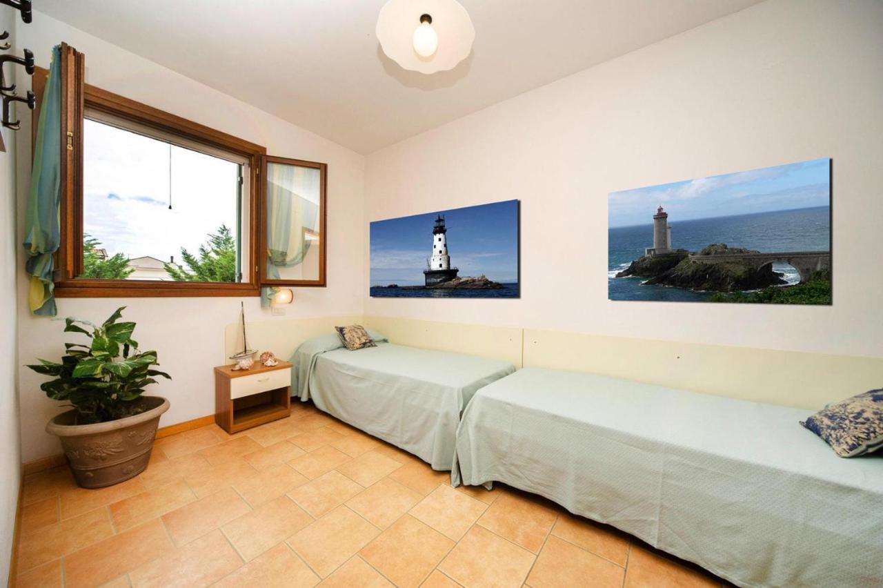 Terraced House In The Ca' Del Pino Holiday Complex With Communal Pool In 比比翁 外观 照片